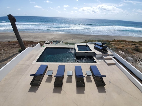 A slice of heaven: Where the pool meets the endless horizon of the beach