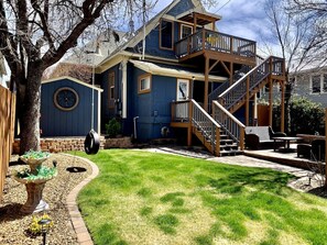 Fully fenced backyard w/ BBQ outdoor seating and tire swing :)
