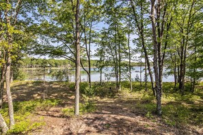View of the lake from the backyard. Lots of wild blueberries in late July.