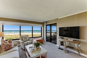 Living and Dining Area with Oceanfront Views and Balcony Access