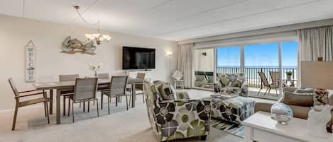 Oceanview from Living Room with TV and Dining Area