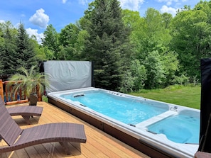 The new swimspa with attached deck - a great way to get a morning swim, or to soothe your muscles after a hike! With a pool side and a hot tub section, the choice is yours!