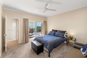 Master bedroom - queen bed, walk-in robe and ensuite. Electric heater and fan.