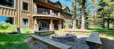 Exterior-Backyard w/fire pit and seating