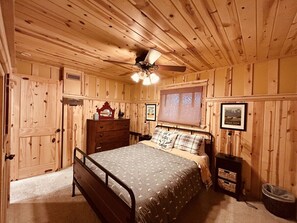 Bedroom 1 with queen bed on main level