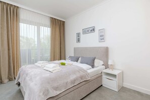 Stylish bedroom with a double bed and closet.