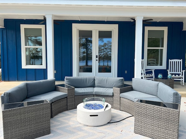 Amazing back porch with wonderful view of the lake.