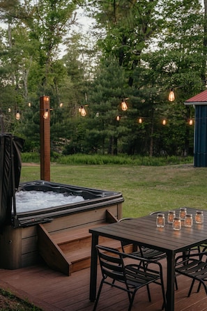 Enjoy the great outdoors on the large floating deck, perfectly set up for outdoor dining and relaxation.  The hot tub is the perfect spot to unwind after an adventure filled day.  