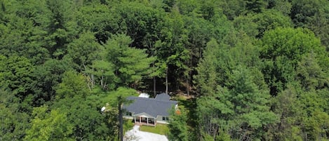 Truly nestled on 5+ acres and LESS than 0.8miles to downtown Great Barrington