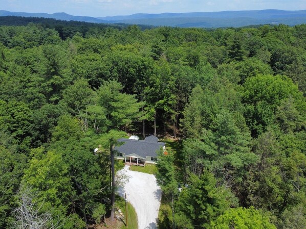 Truly nestled on 5+ acres and LESS than 0.8miles to downtown Great Barrington