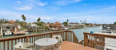 Enjoy spacious deck overlooking canal