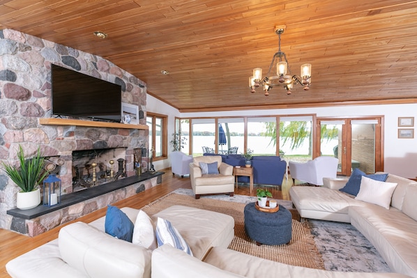 View of the great room looking out on the lake.