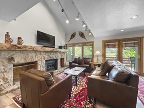 Cozy Living Room with Fireplace and TV