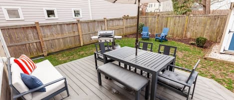 Head out to the cozy fenced in yard for some fresh air!  The Weber grill is ready for your BBQ night!