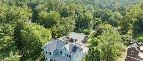 the Manor on Main and  mountain ranges in the background