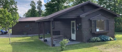 Front/side of cabin- park in driveway on left or in front of the window on right