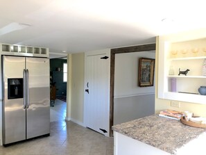 Kitchen looking towards dining and living rooms