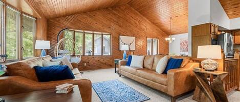 Living room with vaulted ceilings and great view