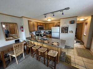 Dine in kitchen stocked with all the appropriate kitchenware for a dinner in! 