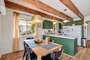 Dining area and kitchen. Pine Mountain Lake Vacation Rental "Marina Beach Cabin" - Unit 1 Lot 465