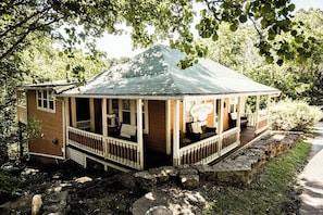 Wrap around porch offers plenty of seating to enjoy a cup of coffee.