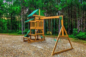 Let the kids explore and have fun on this classic playset, surrounded by nature