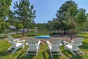 Relax in Adirondack chairs around the fire pit