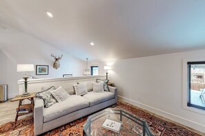 Modern open-concept living - gas fireplace, Smart TV