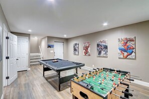 Game room with billiard and table soccer