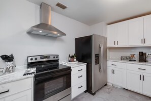 Everything you need to prepare a wonderful meal in the very spacious kitchen.