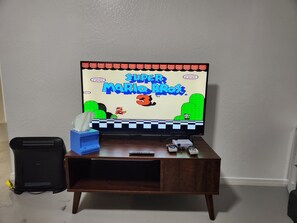 TV Lounge Area | Foosball | Tic-Tac-Toe | Connect4 | Retro Gaming System | Mario