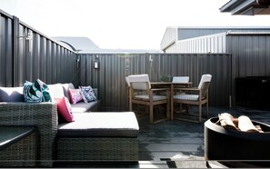 Plenty of outdoor seating with a fire pit