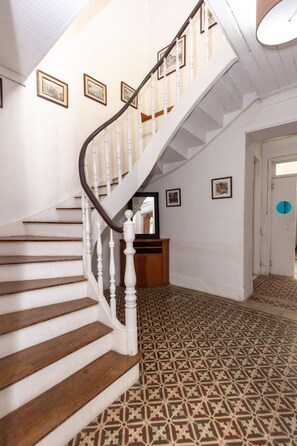 Circular staircase to 3 of the 6 bedrooms upstairs.