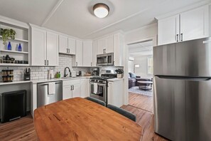 Kitchen peeking into Living Room