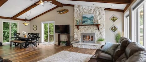 Open concept living and dinning with fireplace