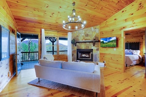 The warmth of the fireplace creates a cozy atmosphere, while the stunning mountain views outside offer a breathtaking backdrop.Enjoy your favorite shows while taking in the majestic scenery;the perfect blend of comfort, relaxation, and entertainment.