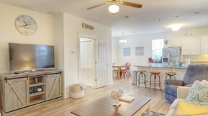 Open living area with half bathroom downstairs. Full size washer and dryer in the half bath.