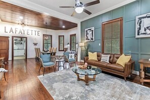 Huge, open concept living room with all the amazing designs and character.