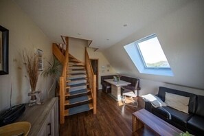 Wohnstube / Treppe zum Schlafzimmer