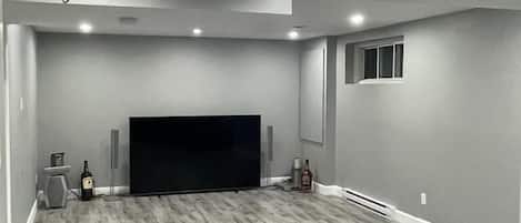 Living Room with 85 inches LED TV