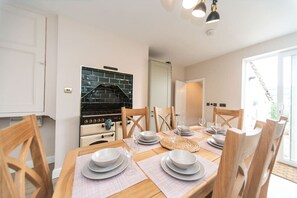 kitchen with dining area and range master