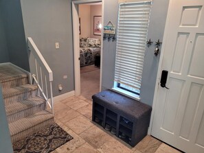 Foyer looking into the bedroom with office space