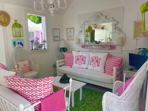 Breezeway with access to courtyard, side patio and twin room.