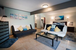 2 queen sofa beds, coffee table & space for yoga or workouts.