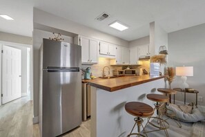Large kitchen with all the appliances you need for cooking.
