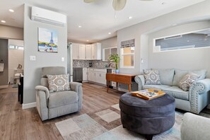 Living Room leading into the Kitchen.