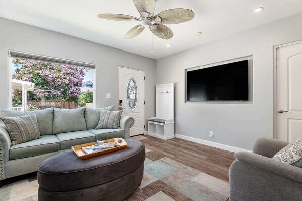 Living Room with 65* TV.