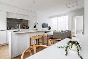 Designer kitchen + open plan living and dining