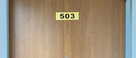 There is a key box on the doorknob of the entrance door of 503.