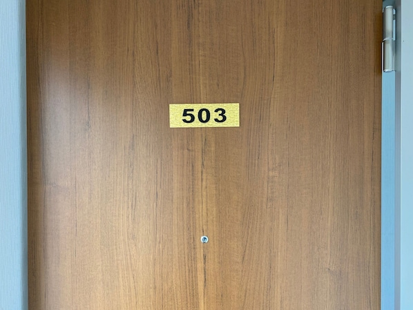 There is a key box on the doorknob of the entrance door of 503.